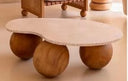 Suar coffee table with sphere legs

Natural finish
