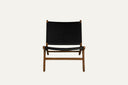 Teak lounge chair with synthetic rattan lining