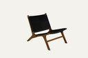 Teak lounge chair with synthetic rattan lining