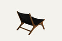Teak lounge chair with synthetic rattan lining