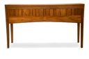 Teak console with square motif rattan drawers
