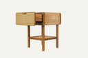 Teak bedside table - with square motif rattan